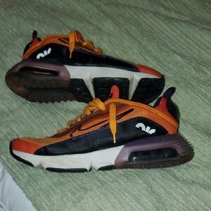Orange /Black/ Purple Nikes 5y=6.5 Womans